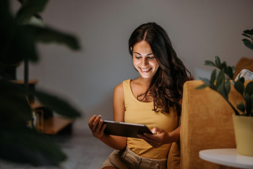 Adult woman, connecting on her home internet.