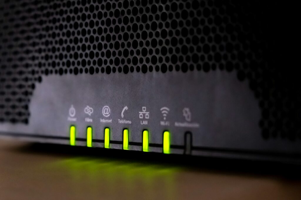 LED indicators of a router flash with a Wi-Fi signal.