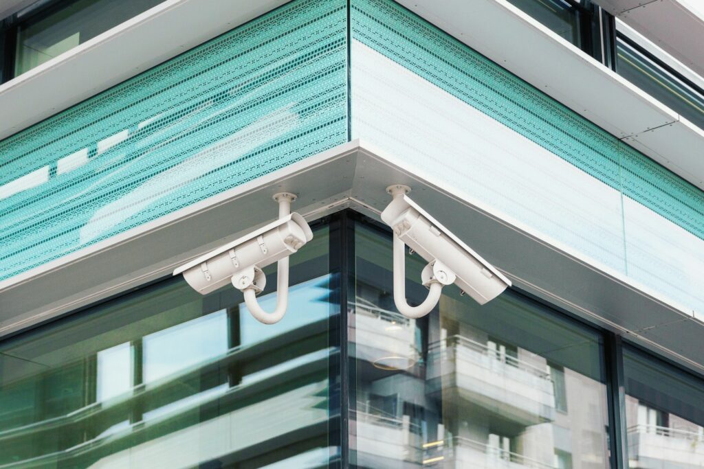 Two modern cctv security cameras on modern building facade