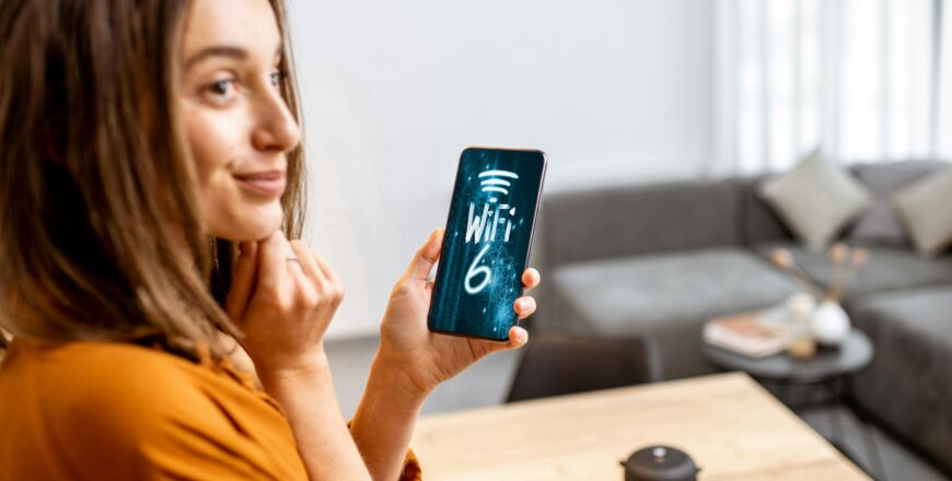 Woman using smart phone with 6 wi-fi network